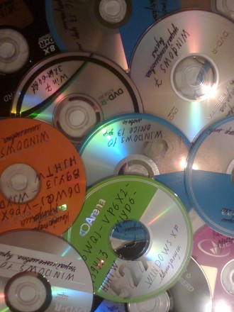 CD та DVD диски з комп'ютерними програмами та іграми, фільмами, піснями та . . фото 6