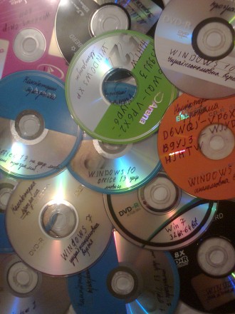 CD та DVD диски з комп'ютерними програмами та іграми, фільмами, піснями та . . фото 4