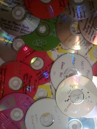 CD та DVD диски з комп'ютерними програмами та іграми, фільмами, піснями та . . фото 3