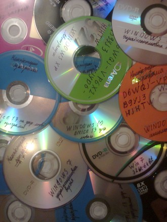 CD та DVD диски з комп'ютерними програмами та іграми, фільмами, піснями та . . фото 5