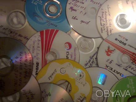 CD та DVD диски з комп'ютерними програмами та іграми, фільмами, піснями та . . фото 1