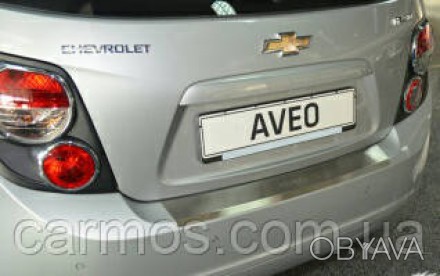 Накладка на задний бампер Chevrolet AVEO 2012 > (SD) без загиба с логотипом (нер. . фото 1
