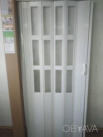 Дверь гармошка полуостеклённая
Полуостекленная пластиковая дверь – гармошка комп. . фото 1