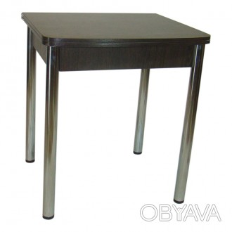 Стол обеденный раскладной с металлическими хромированными ногами, которые имеют . . фото 1