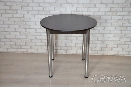 Круглый стол Тавол Крег с хромированными металлическими ногами, которые имеют ре. . фото 1
