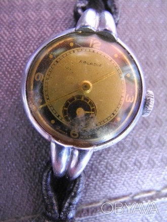 Винтажные женские механические часы Arcadia (Swiss made) на запчасти

Доставка. . фото 1