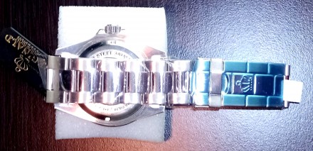 НОВИЙ у заводських плівках з кварцовим механізмом класичний годинник в дизайні с. . фото 6