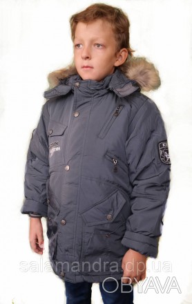 
 
Шикарная теплая куртка для мальчика с капюшоном и натуральной опушкой .
Капюш. . фото 1