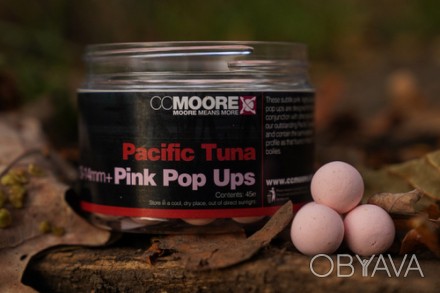  Плавающие протеиновые шарики из тихоокеанского тунца в белом и розовом цвете. А. . фото 1