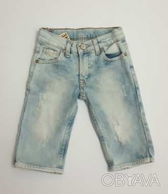 Удлиненные джинсовые шорты для мальчика с потертостями
Состав: 97% cotton, 3%ela. . фото 1