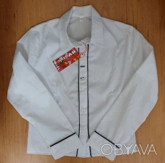 Школьная рубашка для девочки белого цвета
Модель укороченная
Производитель: Укра. . фото 1