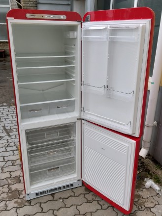 Двухмоторный ретро холодильник Смег Smeg FAB32R6 красный б/у
Доставка оригиналь. . фото 6