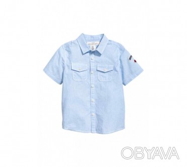 
Рубашка с коротким рукавом от H&M отлично впишется в летний гардероб юного джен. . фото 1