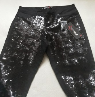 Продам  новые сияющие женские брюки/штаны/джинсы в пайетках марки FB S. . фото 3