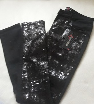 Продам  новые сияющие женские брюки/штаны/джинсы в пайетках марки FB S. . фото 2
