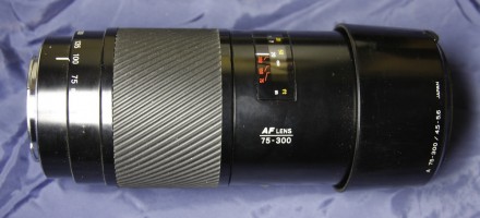 Minolta AF 75-300 mm f/ 4.5-5.6 - длиннофокусный объектив с переменным фокусным . . фото 3