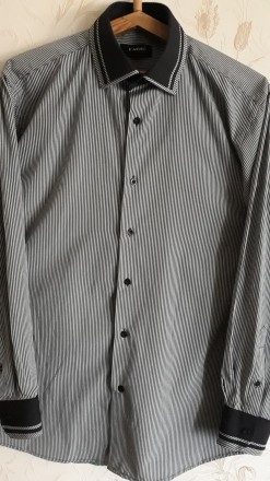 Мужская рубашка с длинным рукавом
Ткань 80% cotton 20% polyester
Ворот: 42
Пл. . фото 5