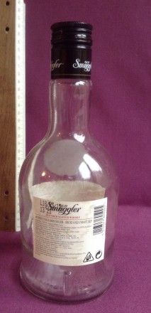 Бутылка от алкоголя Старый контрабандист.
Виски Old Smuggler. Стекло.
Высота 2. . фото 3