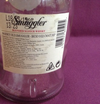 Бутылка от алкоголя Старый контрабандист.
Виски Old Smuggler. Стекло.
Высота 2. . фото 4