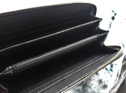 Женский удобный кожаный кошелек серого цвета
Стильный дизайн, отличное качество,. . фото 5