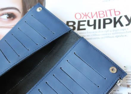 Женский удобный кожаный кошелек синего цвета
Стильный дизайн, отличное качество,. . фото 10