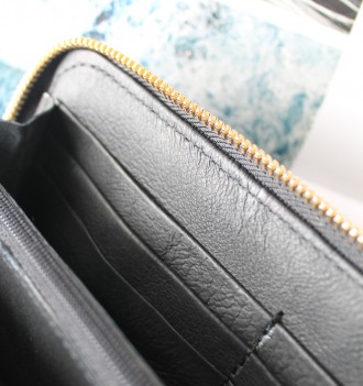 Женский кожаный кошелек черный
Стильный дизайн, отличное качество, итальянская н. . фото 4