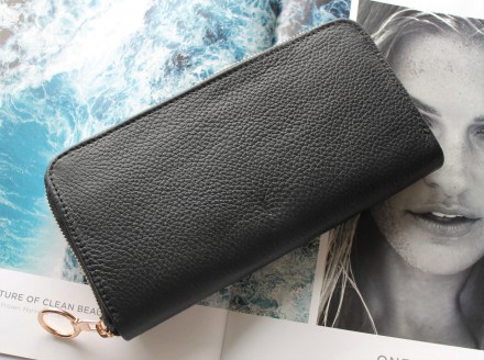 Женский кожаный кошелек черный
Стильный дизайн, отличное качество, итальянская н. . фото 2