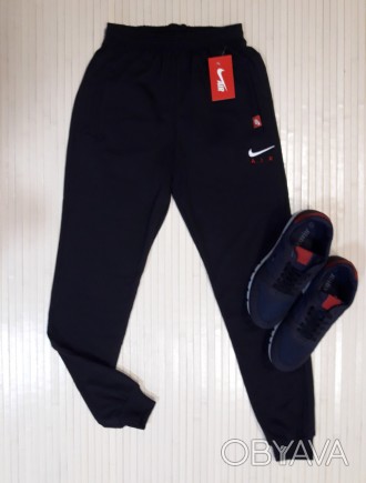 Код товара: 2039.5
Мужские спортивные штаны с двумя карманами на молнии, нижняя . . фото 1