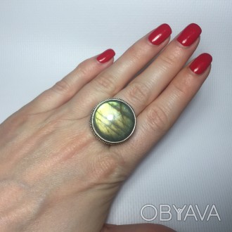 Предлагаем Вам купить элегантное кольцо с камнем лабрадор в серебре.
Размер 19,5. . фото 1