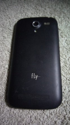 Продам телефон Fly IQ 4404 на запчасти,экран целый,батареи нет,включался через р. . фото 4