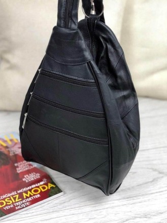 Рюкзак изготовлен из натуральной кожи, закрывается на молнию
Внутри рюкзака один. . фото 3