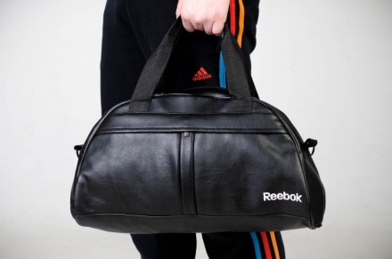 Сумка кожзам черный Reebok c белым лого. Київ. фото 1 Сумка кожзам черный Reebok c белым лого. Київ. фото 1
