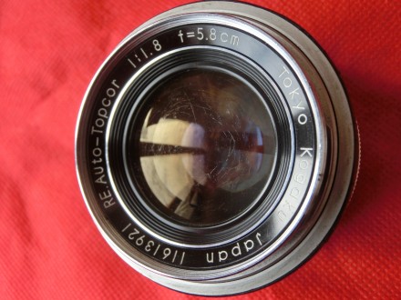 Это  первая 35-мм зеркальная фотокамера, с измерением через объектив. Экспозиция. . фото 12