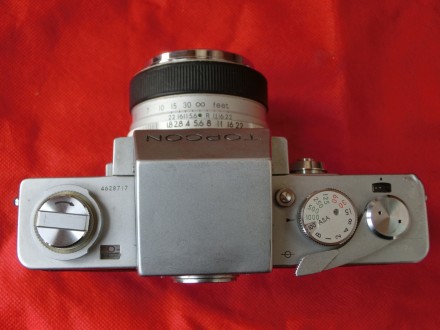 Это  первая 35-мм зеркальная фотокамера, с измерением через объектив. Экспозиция. . фото 5