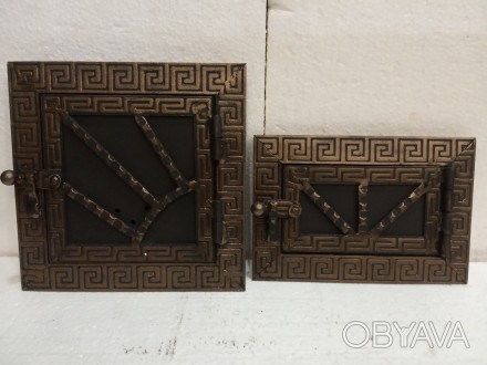 Дверцы для печи сделаны из стали и элементов ковки в греческом стиле.. . фото 1