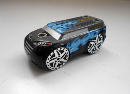 Коллекционная маленькая машинка Racing Real Toy
Серая Racing с большими колесам. . фото 2