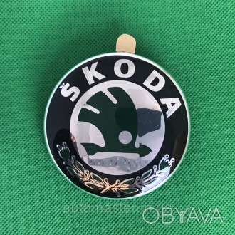 Эмблема Skoda на Капот/багажник 79 мм. темно-зеленая 1U0 853 621c
Логотип металл. . фото 1