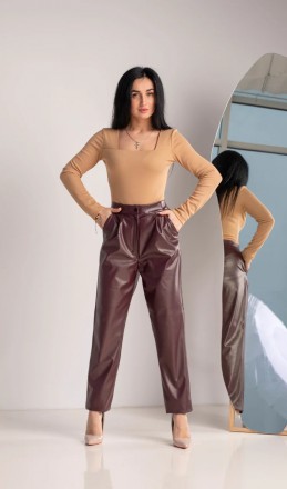 Размеры 44,46,48,50,52
Женские брюки из эко- кожи, которые отлично ложатся по фи. . фото 2