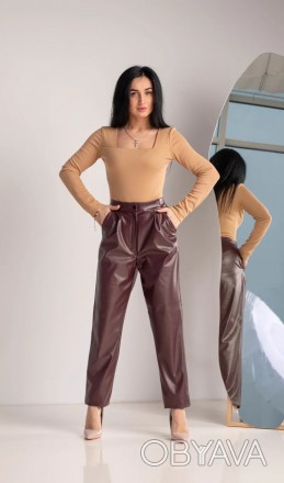Размеры 44,46,48,50,52
Женские брюки из эко- кожи, которые отлично ложатся по фи. . фото 1