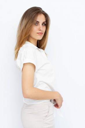
Легкая блузка от турецкой фабрики Seul. Цвет блузки белый с узором в виде абстр. . фото 5