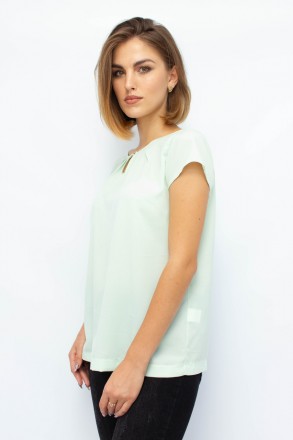 
Легкая блузка от турецкой фабрики Ena. Блузка бирюзового цвета. Материал блузки. . фото 4