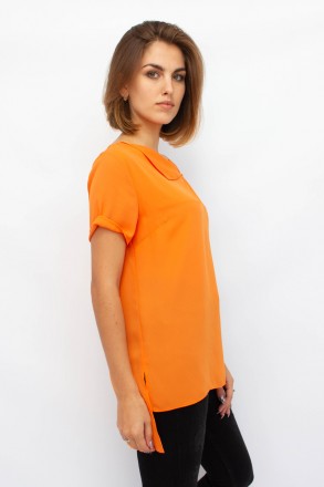 
Легкая блузка от турецкой фабрики Mascioni. Блузка однотонного оранжевого цвета. . фото 3