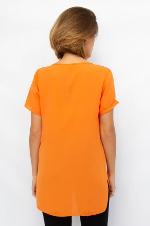 
Легкая блузка от турецкой фабрики Mascioni. Блузка однотонного оранжевого цвета. . фото 5