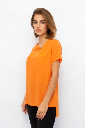 
Легкая блузка от турецкой фабрики Mascioni. Блузка однотонного оранжевого цвета. . фото 4