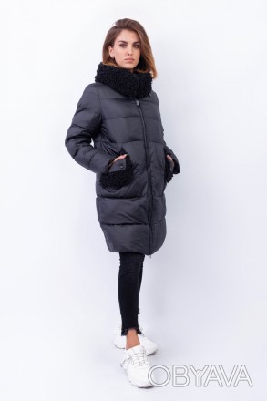 
Зимняя куртка черного цвета с необычным мехом на воротнике и карманах. Куртка п. . фото 1