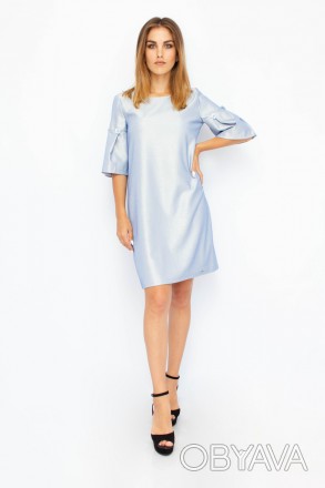 
Стильное платье Jeanne D'ark голубого цвета, ткань блестящая. Ткань плотная, бе. . фото 1