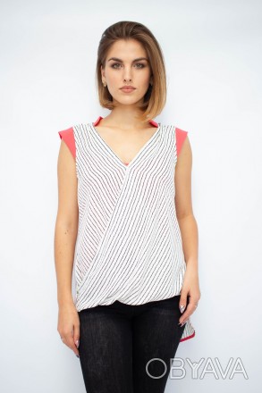 
Легкая блузка от турецкой фабрики Ladyform. Блузка белого цвета с принтом в вид. . фото 1