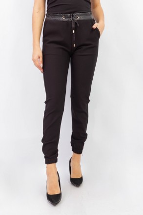 
Стильные женские брюки-джоггеры однотонного черного цвета, производство Esparan. . фото 2