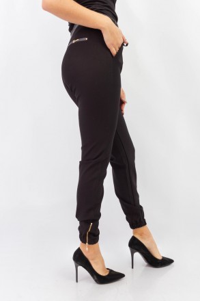 
Стильные женские брюки-джоггеры однотонного черного цвета, производство Esparan. . фото 4