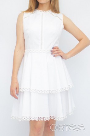 
Оригинальное платье Lilium, производство Турция. Платье белого цвета с двухуров. . фото 1
